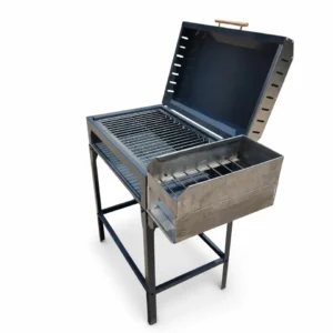 Chulenguito dual zone charcoal BBQ grill with flip lid, wood handle and stainless steel side firebox on white background, CE RoHS certified
