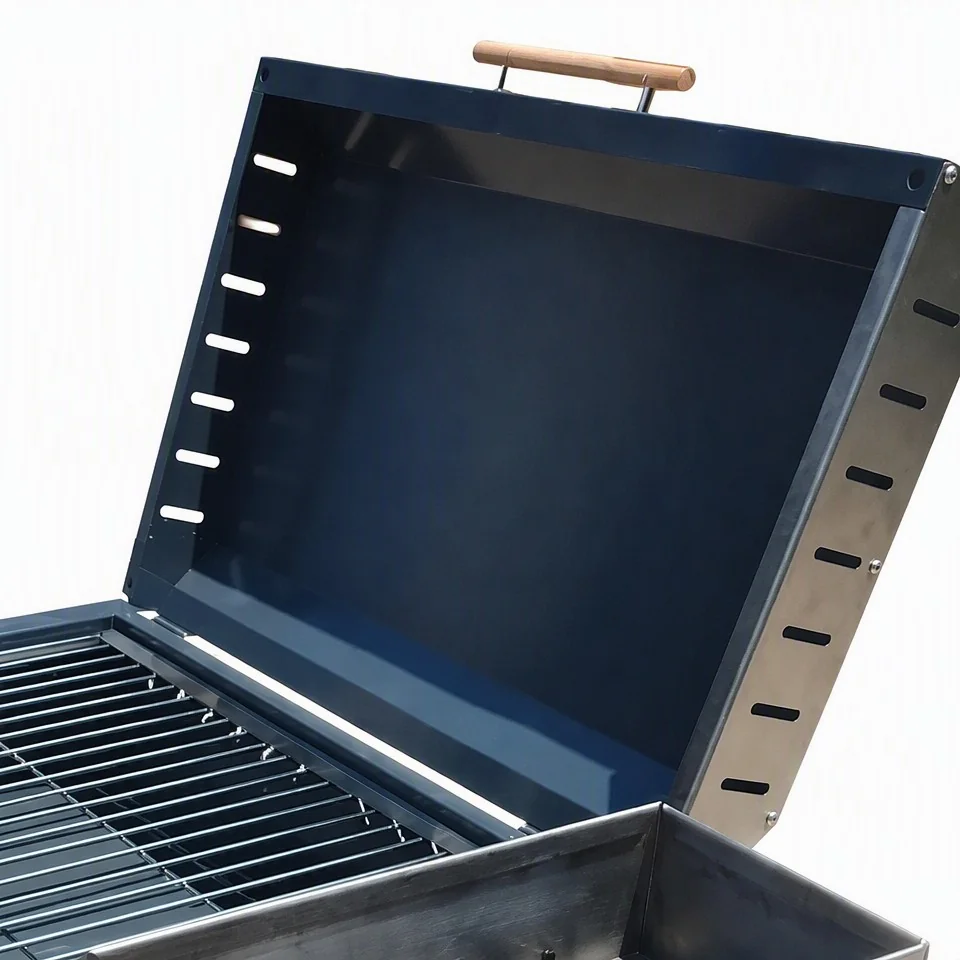 Chulenguito charcoal BBQ grill cool-touch wooden flip lid handle with ventilation slots close up